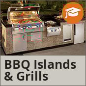 Outdoor kitchen with a stainless steel grill full of food at nighttime
